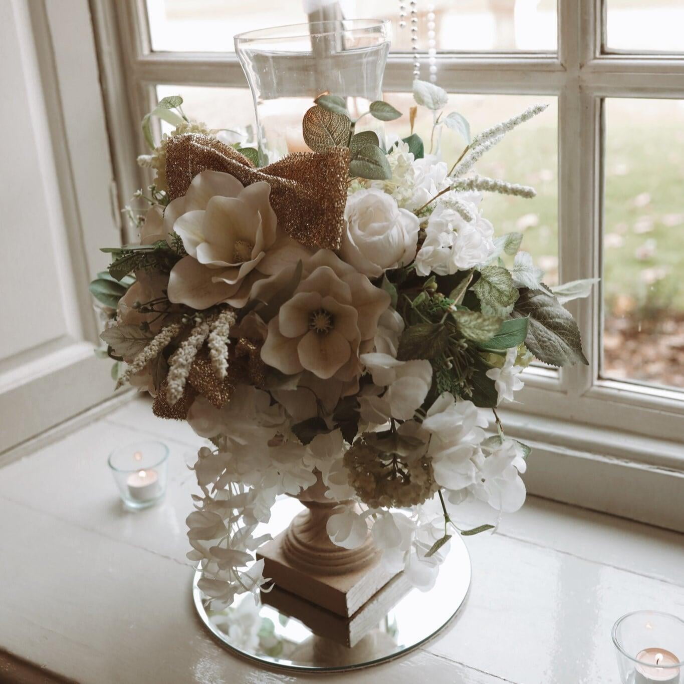 Flowers in window at wedding